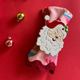 madcap cottage hand-painted metal napkin rings featuring a Jolly Santa design.
