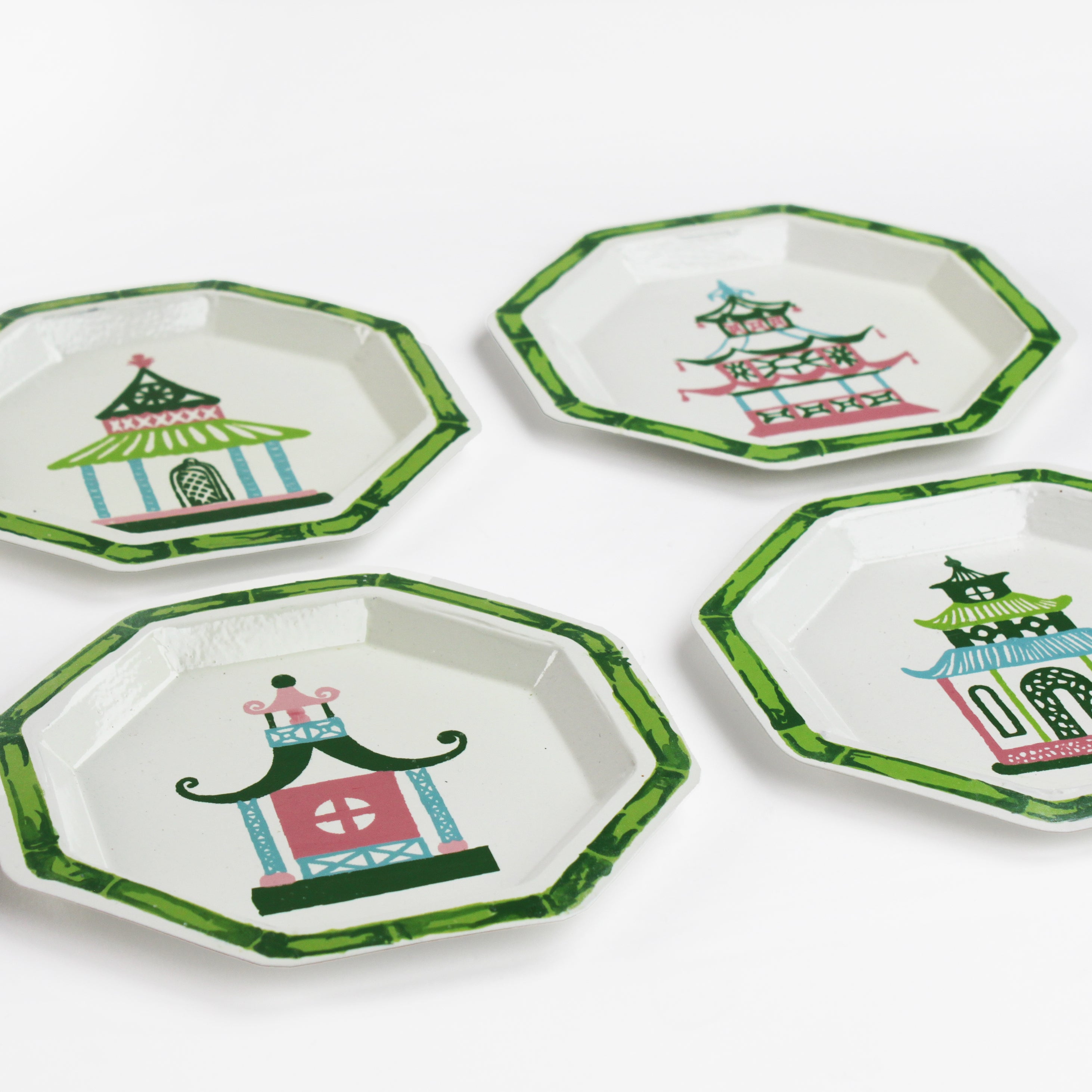 Pagodas Hand Painted Tole Metal Trays, Set of 4 white, trimmed in green, with pink, green, blue, and pink pagodas each different