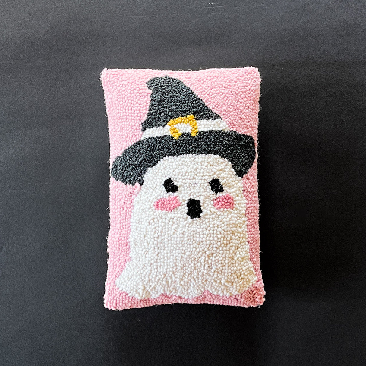 Halloween throw pillow with white ghost black witch hat design