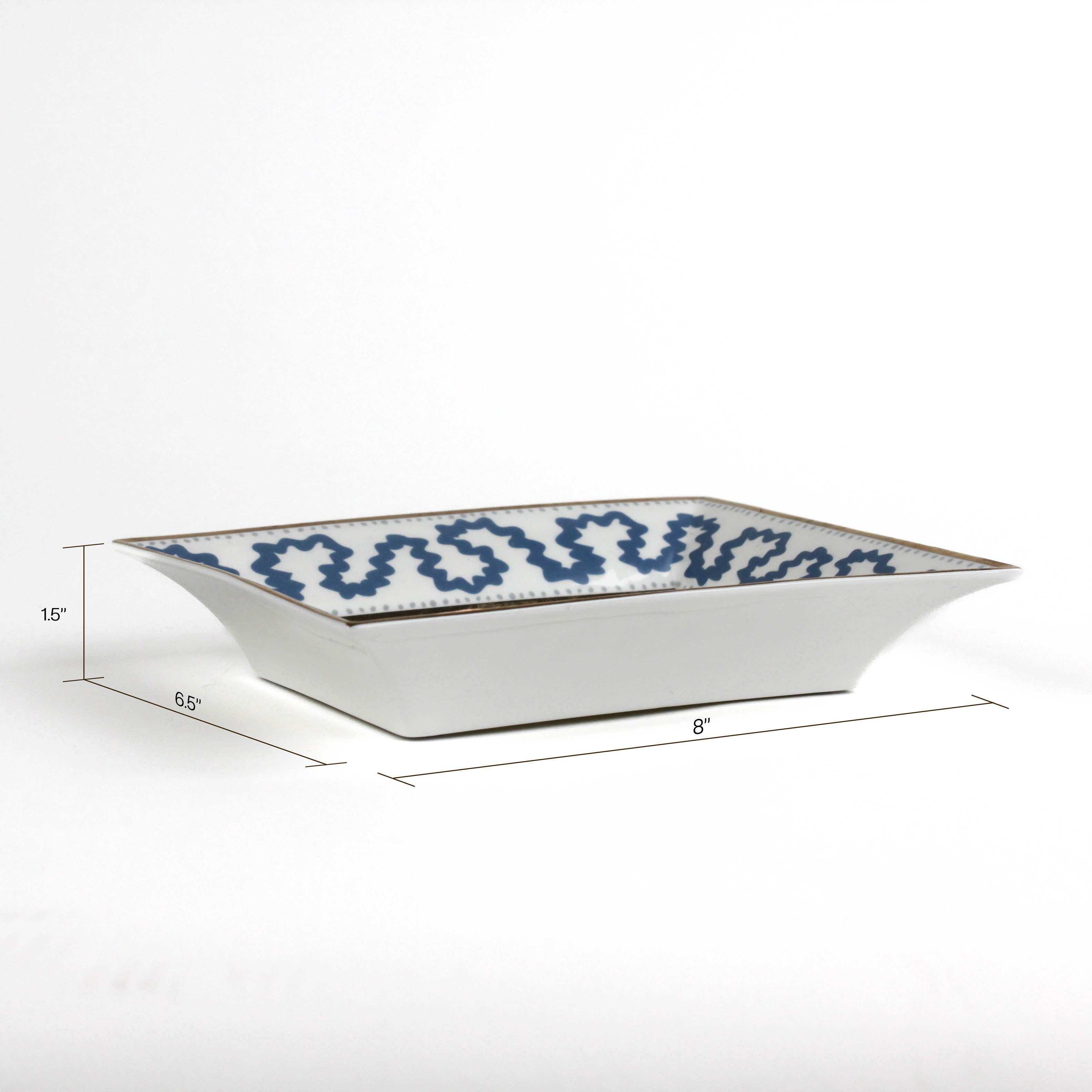 the image shows the dimension of the Madcap Cottage blue and white trinket tray with a gold border and a saying that says The less you talk, the smarter you seem.  1.5" x 6.5" x 8"