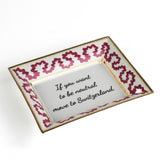 Madcap cottage pink and white porcelain trinket tray with a gold border and a saying that says If you want to be neutral move to Switzerland.