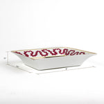 dimensions of the Madcap cottage pink and white porcelain trinket tray with a gold border and a saying that says If you want to be neutral move to Switzerland.  1.5" x 6.5" x 8"