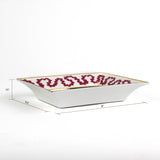 dimensions of the Madcap cottage pink and white porcelain trinket tray with a gold border and a saying that says If you want to be neutral move to Switzerland.  1.5" x 6.5" x 8"