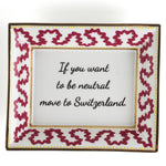 Madcap cottage pink and white porcelain trinket tray with a gold border and a saying that says If you want to be neutral move to Switzerland.