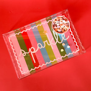 Stripe acrylic tray with the word sparkle written on it.