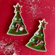 Green ceramic tree accent plate with star at top 