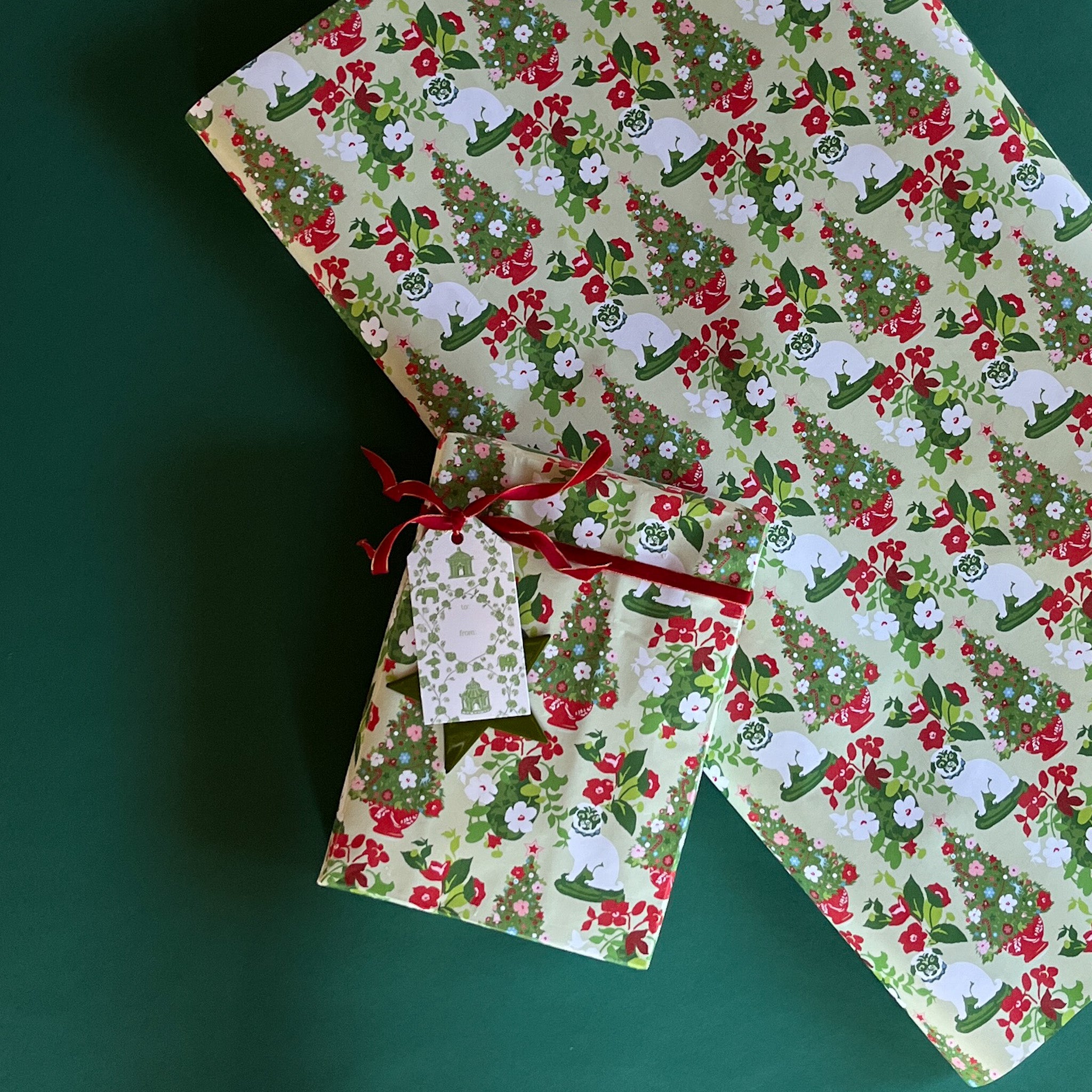 Pug Christmas Wrapping paper with a pug and Christmas tree motif