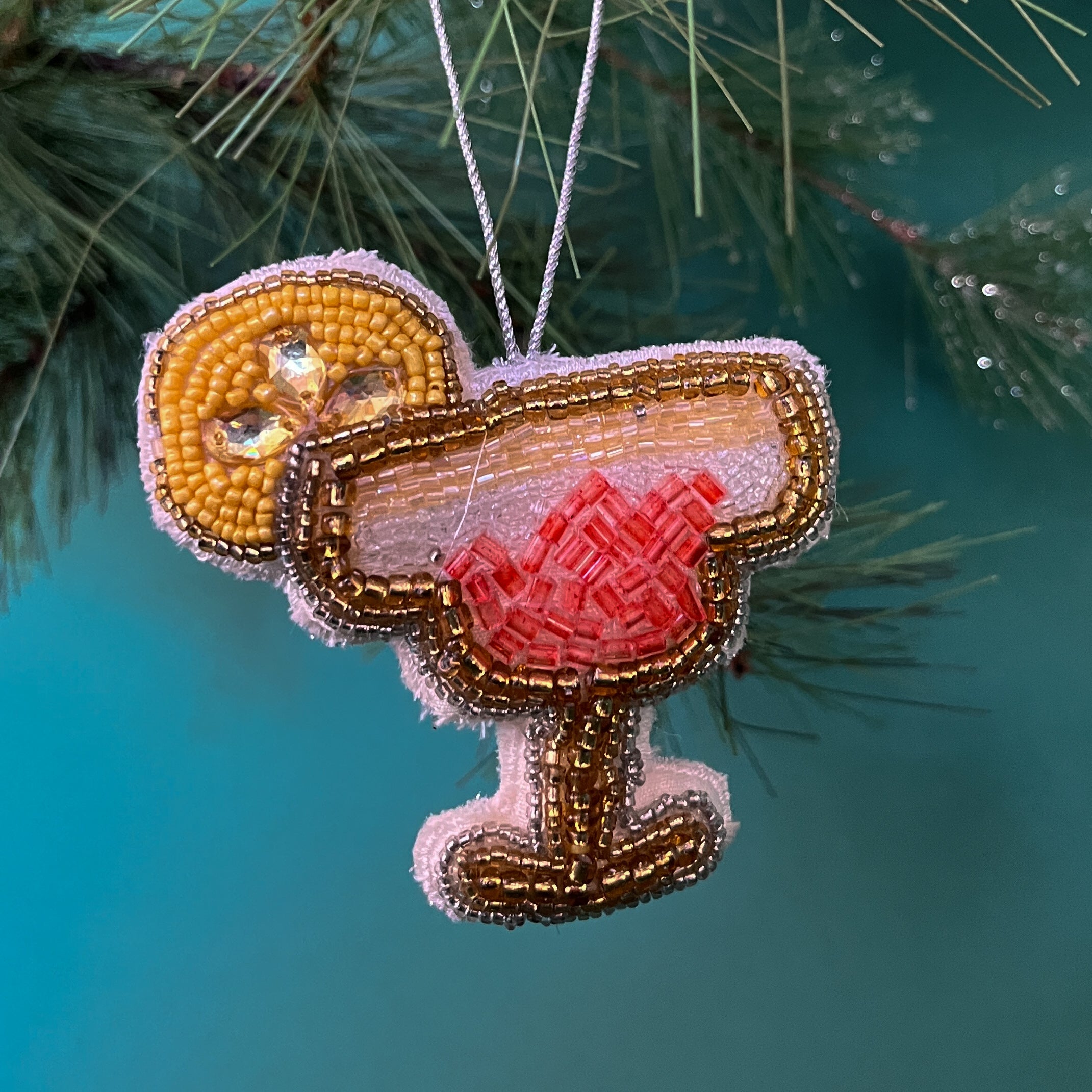 A beaded Christmas Cocktail ornament