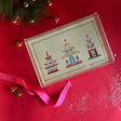 Festive Pagodas Rectangular Acrylic Tray, in 2 sizes.  Three different style pagodas on a green background.  Festive border of dots under a small scallop.