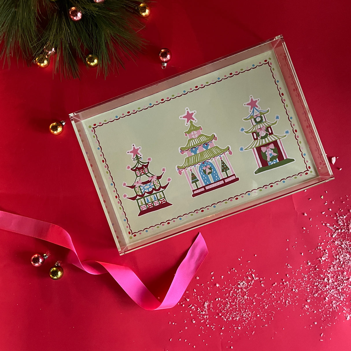 Festive Pagodas Rectangular Acrylic Tray, in 2 sizes.  Three different style pagodas on a green background.  Festive border of dots under a small scallop.