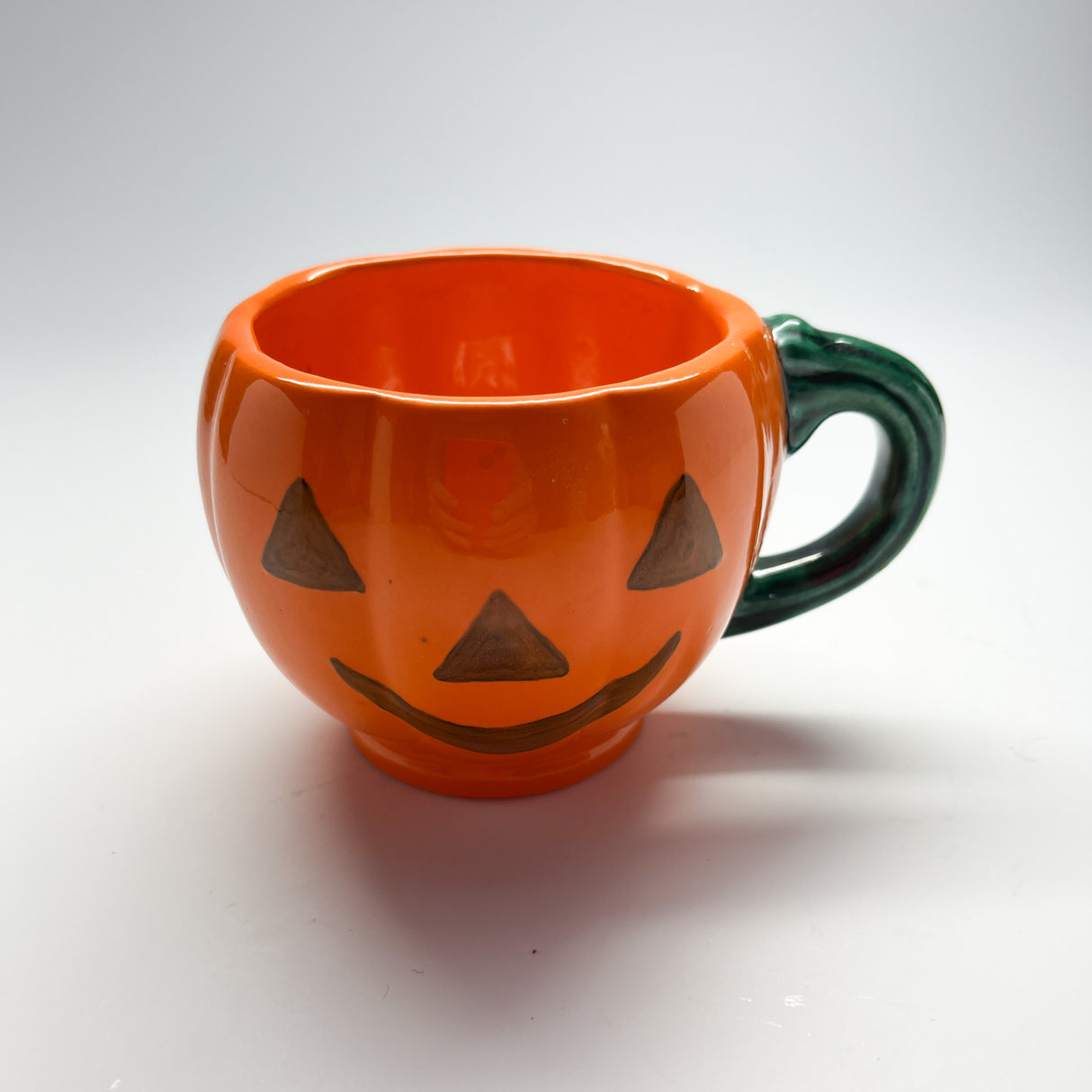 Madcap cottage orange jack o'lantern halloween coffee mug.