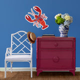 Madcap Cottage lobster coastal wall decal displayed in a colorful coastal-inspired room.