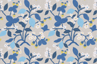 Lemon and strawberry wallpaper in blue and white motifs against a grey background