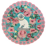 A pink and green floral rug featuring a scalloped border and large central pug motif