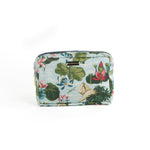 Meadow Club toiletry bag in sky blue features a lily pond pattern in a white background