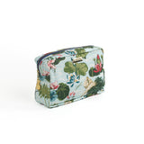 Meadow Club toiletry bag in sky blue features a lily pond pattern in a white background