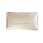 Back view of a rectangular holiday pillow with a soft beige fabric and envelope-style closure.