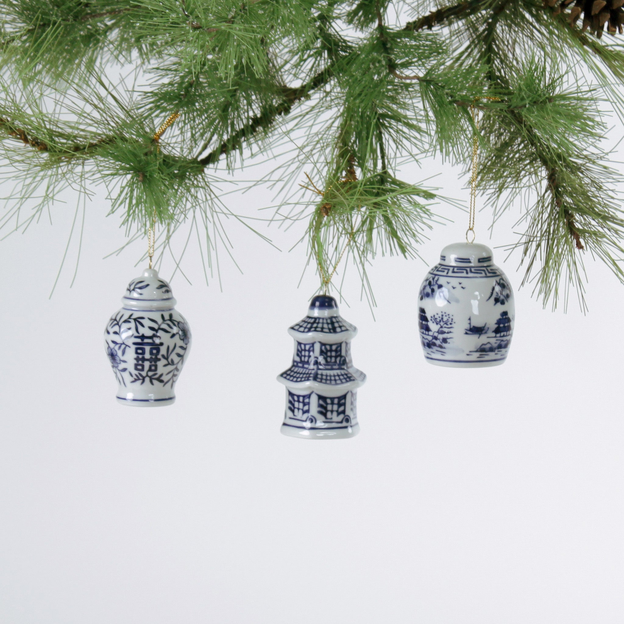 three miniature blue and white Chinoiserie Christmas ornaments 
