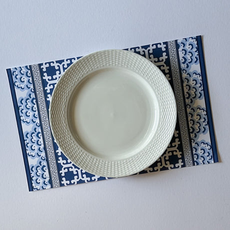 blue paper placemats in a trellis pattern called "Monserrat" by Madcap Cottage