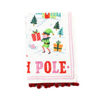 a christmas tea towel with festive motifs and text that reads North Pole in a white background