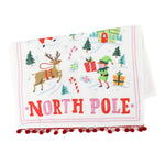 a christmas tea towel with festive motifs and text that reads North Pole in a white background