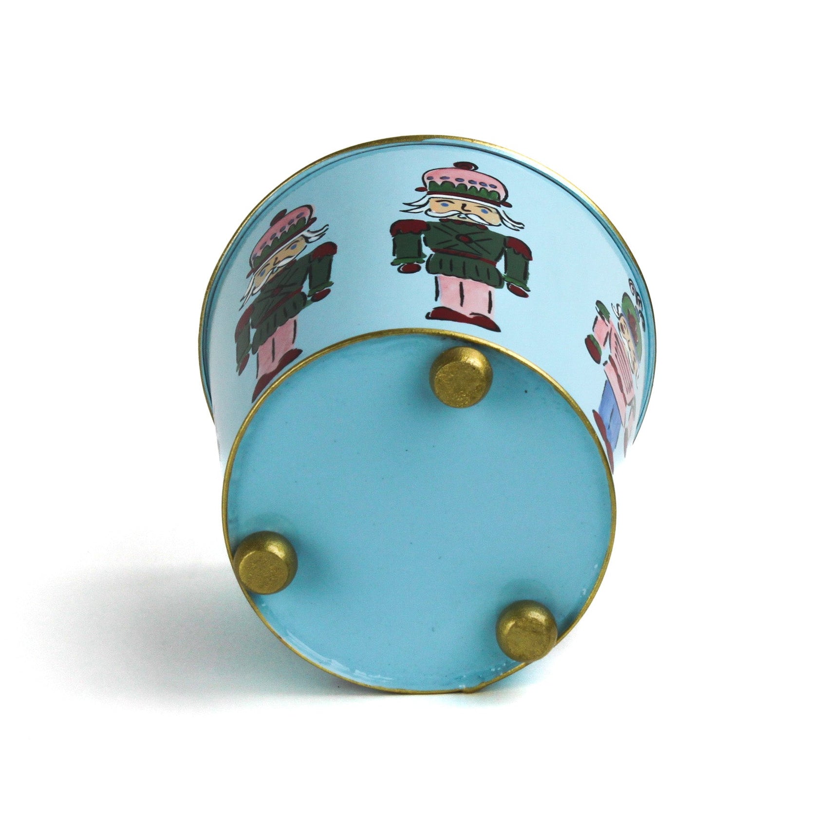 Bottom view of light blue tole cachepot showing gold feet and gold-trimmed base.