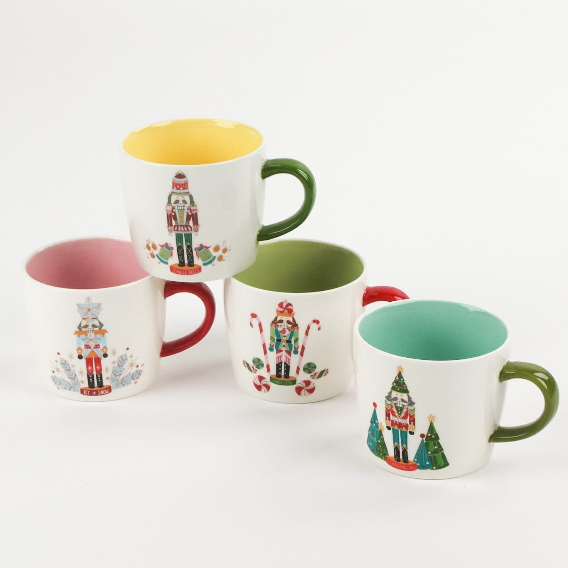 Multicolored Ceramic Nutcracker Christmas Mugs, Set of 4 decorated with a different nutcracker on each mug