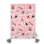 a pink christmas tea towel with nutcracker ballet motifs of swans, ribbons, christmas trees, ballerinas and nutcrackers against a white background. with a madcap cottage card on the bottom side