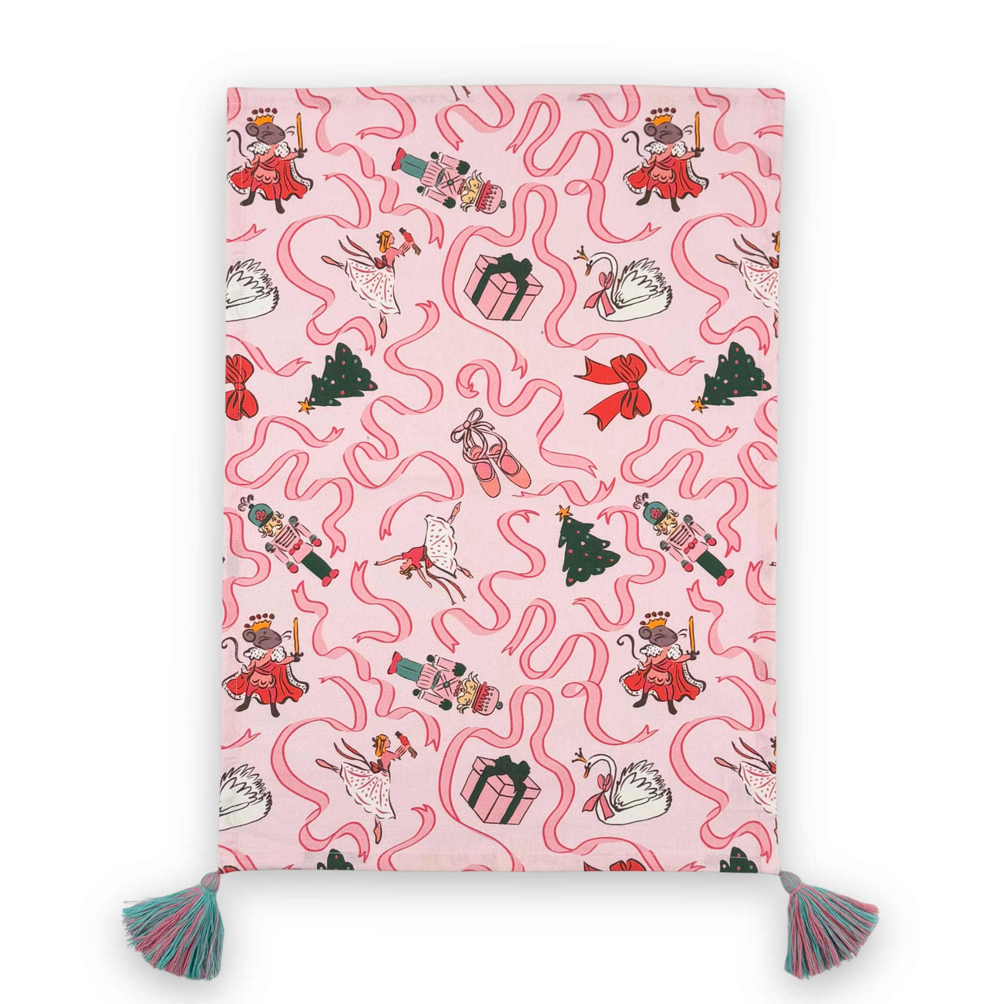 a pink christmas tea towel with nutcracker ballet motifs of swans, ribbons, christmas trees, ballerinas and nutcrackers against a white background. 