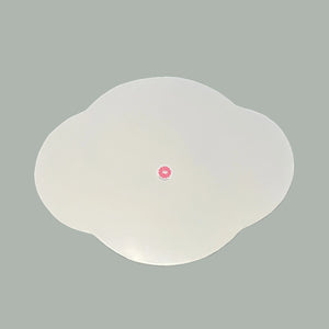 Reverse side of the Oh, Pagoda metal tole tray in a scalloped shape painted white.