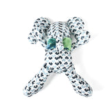Blue and white patterned stuffed elephant toy with a green bow.