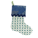 blockprint pattern blue and green christmas stocking  on a white background