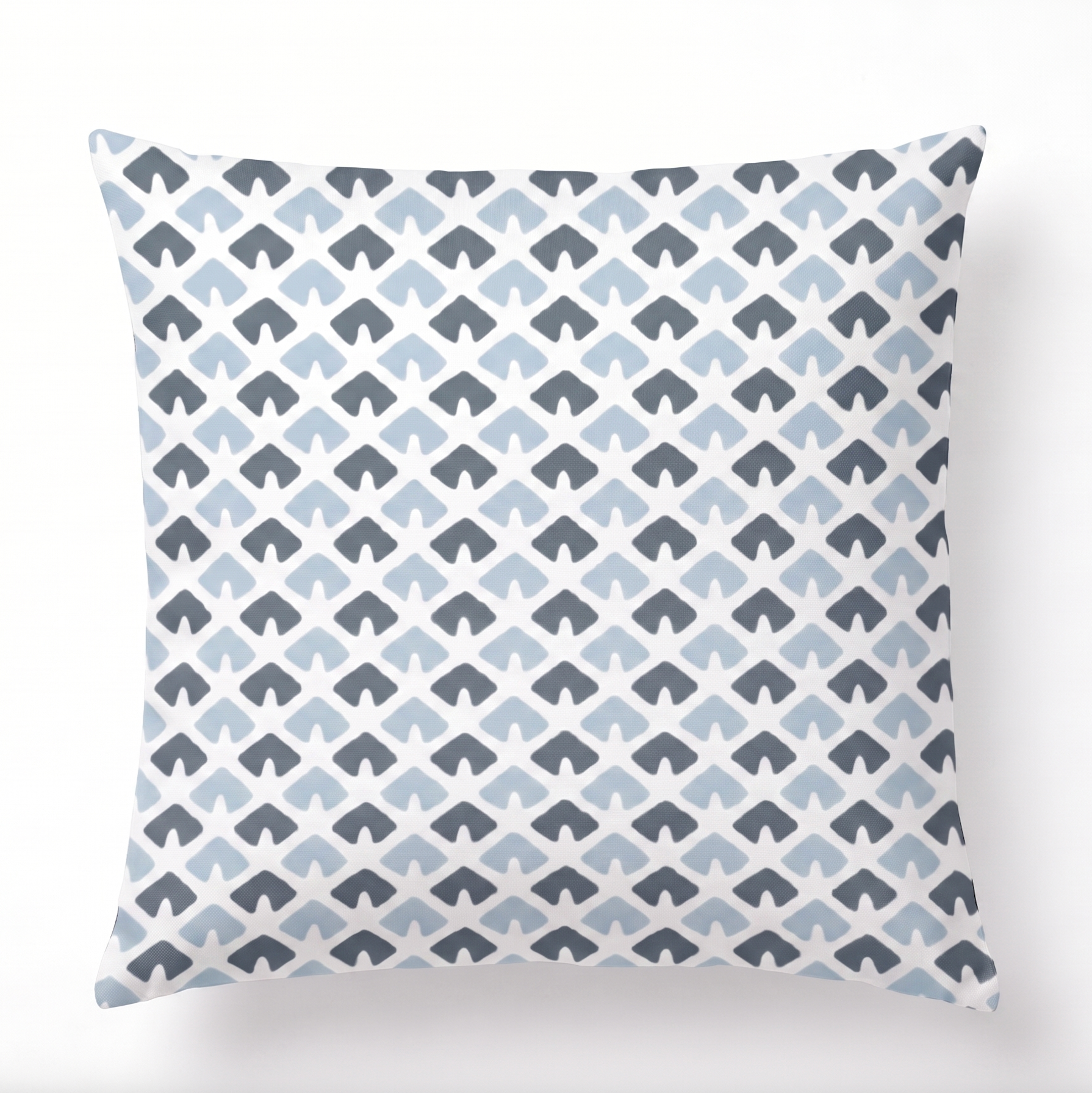 a square blue and white pillow featuring a triangle block print motif in dark blue and light blue. 