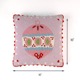Pink Christmas ornament throw pillow with red pom-pom trim, 16" x 16"