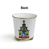 White tole cachepot with hand-painted festive pagoda design and gold trim, standing upright.