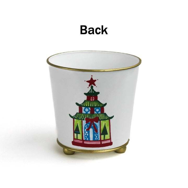 White tole cachepot with hand-painted festive pagoda design and gold trim, standing upright.