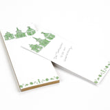 Pagodas Skinny Notepad in green featuring illustrated pagoda designs and floral border in a white background