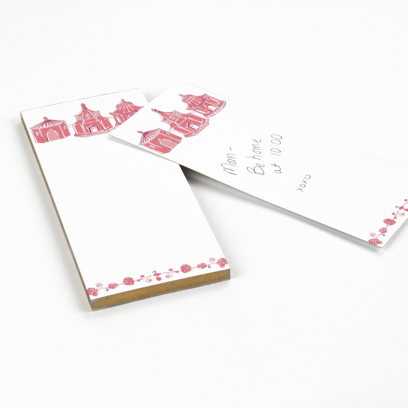 Pagodas Skinny Notepad in pink featuring illustrated pagoda designs and floral border in a white background