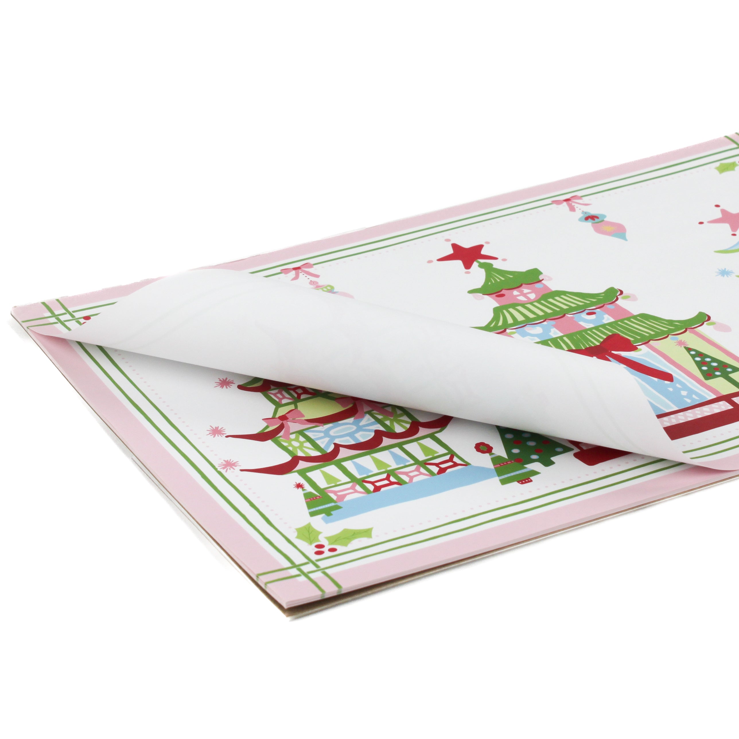 Festive Pagodas Rectangular Paper Christmas Placemats on a white surface.