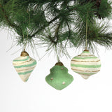 Handcrafted Painted Paper Mache Christmas Ornament Green with glitter details on pine.