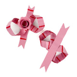 pair of pink striped bow-shaped candleholders without candles