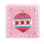 a large pink square Acrylic Trays with Ornament motif on it on a white background
