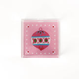a small pink square Acrylic Trays with Ornament motif on it on a white background