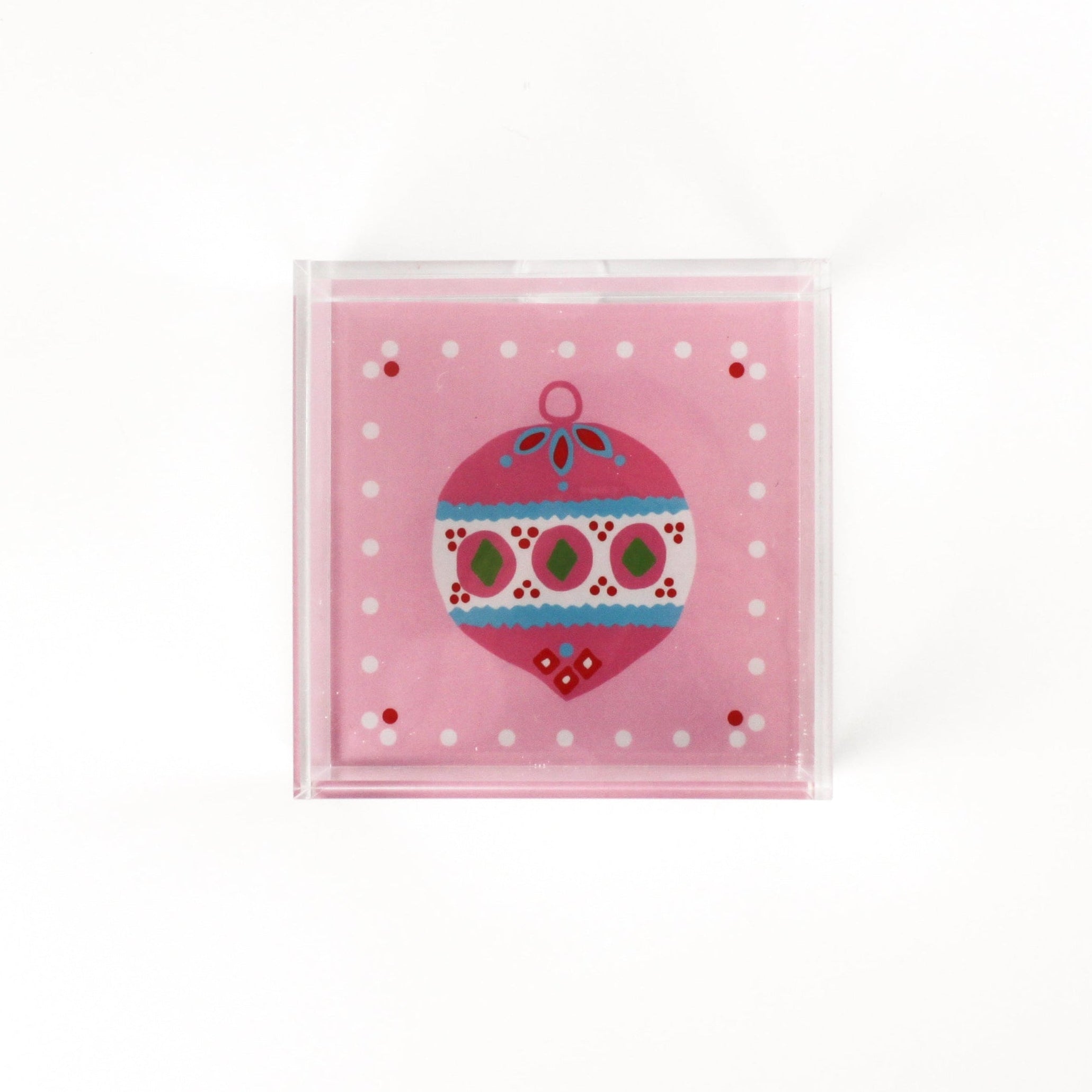 a small pink square Acrylic Trays with Ornament motif on it on a white background