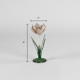 a small metal flower candle holder in the shape of a pink tulip on a white background with a dimension of 5" by 9"