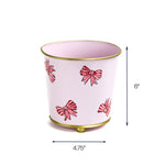 Pink bow tole planter cachepot with hand-painted red bow motif, 6 inch tall and 4.75 inch wide decorative metal planter