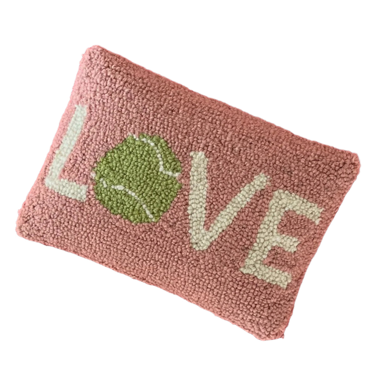 A pink throw pillow with the word LOVE across, with a tennis ball forming the letter O