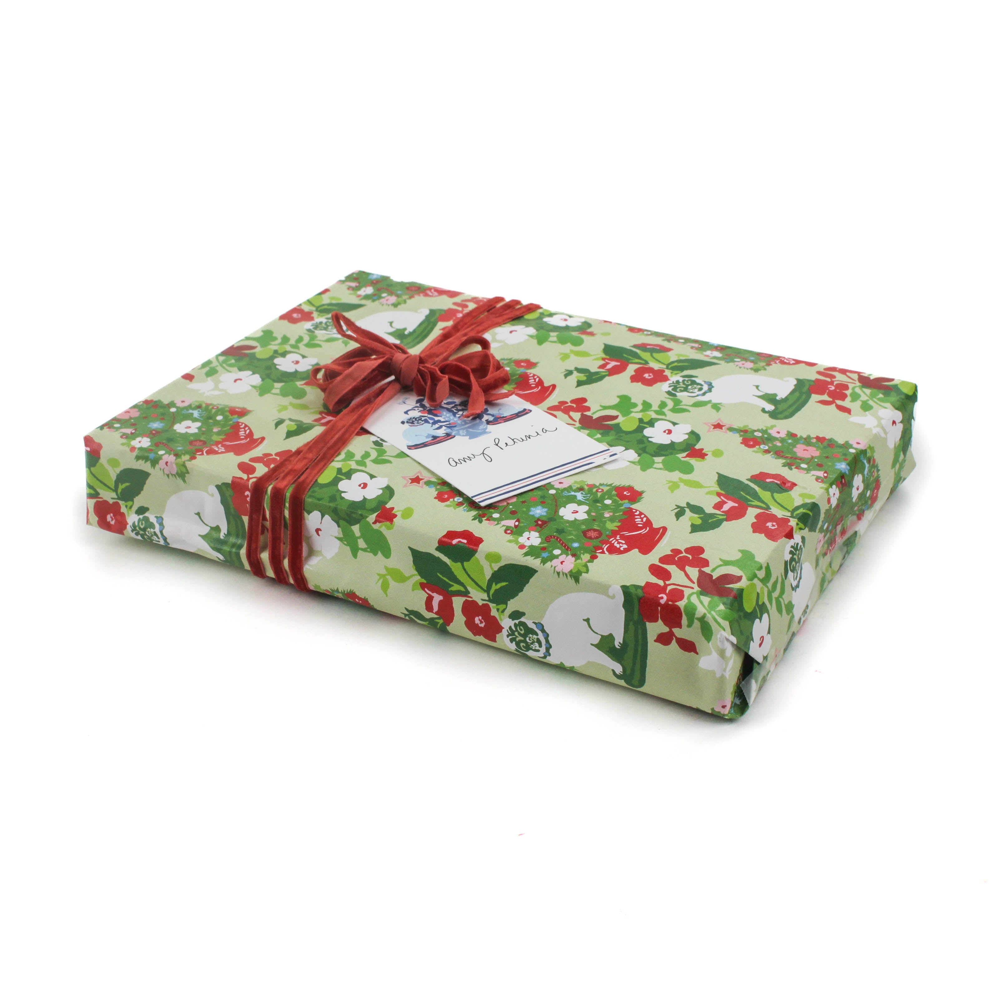 Christmas Pug Wrapping paper with a pug and Christmas tree motif