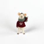 one felt mouse ornaments wearing cozy sweaters with festive designs—a snowflake—topped with a tiny acorn cap and ready to hang.
