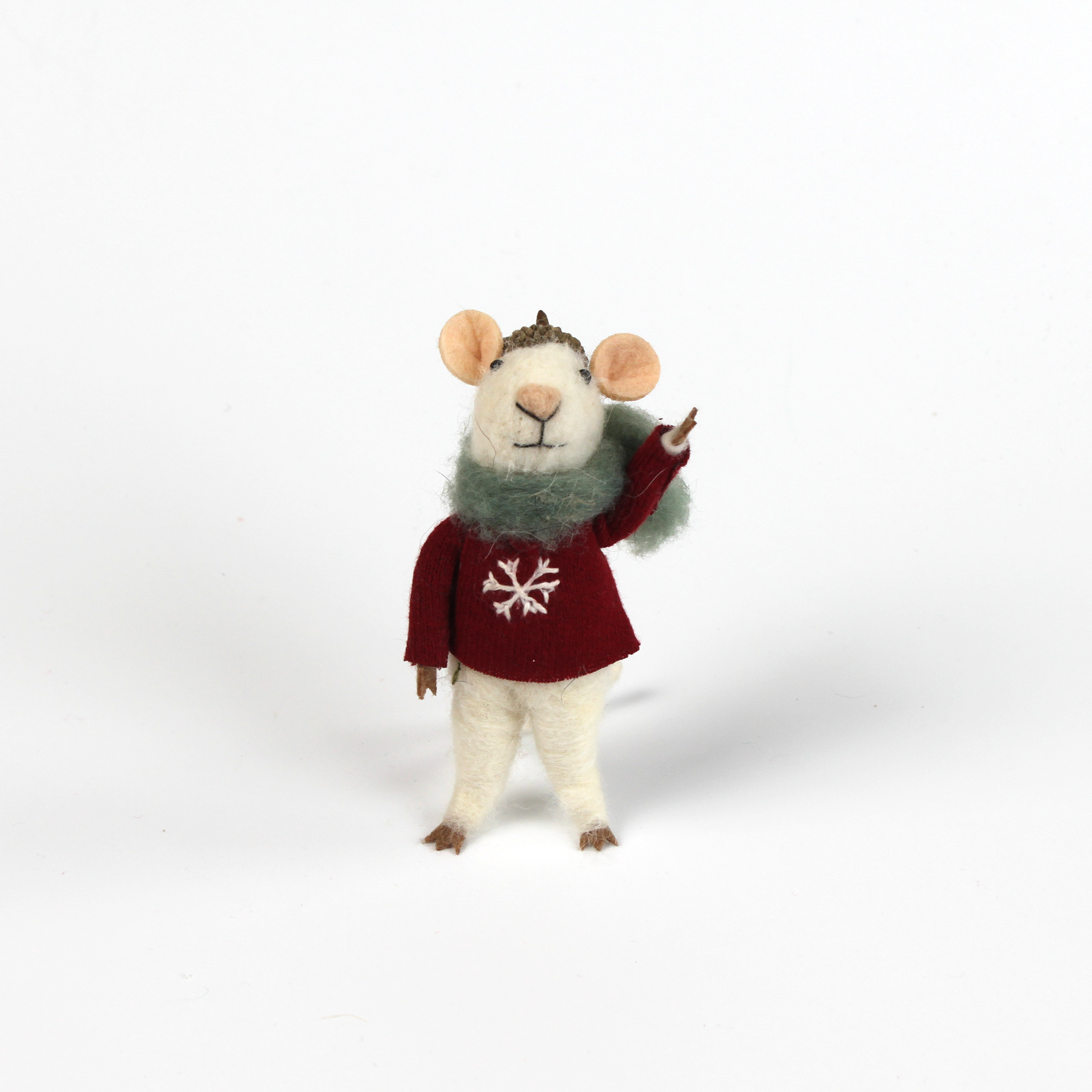 one felt mouse ornaments wearing cozy sweaters with festive designs—a snowflake—topped with a tiny acorn cap and ready to hang.
